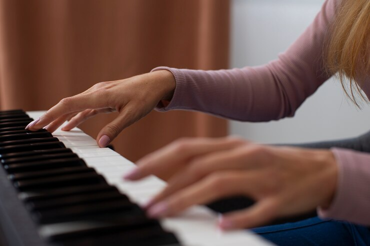 Young child playing the piano